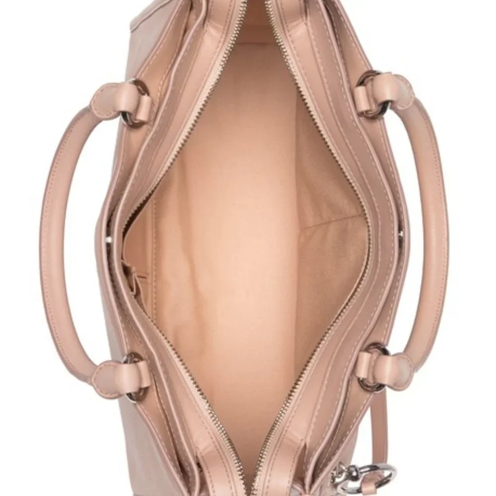 Rebecca Minkoff disclaimer color